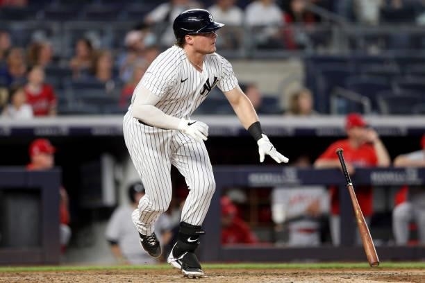 Luke Voit of the New York Yankees hits a RBI double in the fourth inning during the game between the Los Angeles Angels and the New York Yankees at...