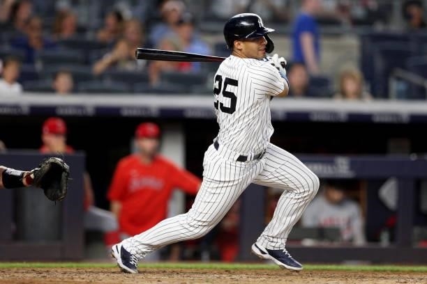 Gleyber Torres of the New York Yankees hits a two-run single in the fourth inning during the game between the Los Angeles Angels and the New York...