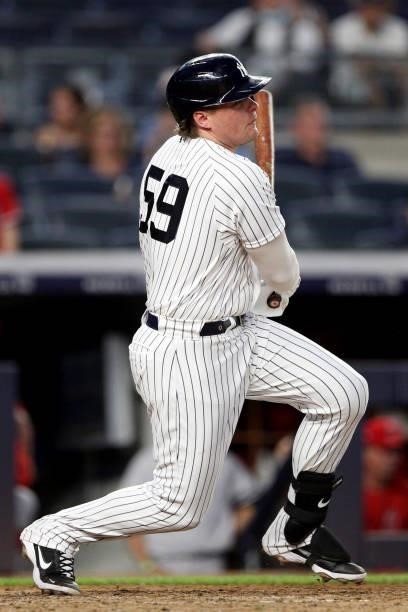 Luke Voit of the New York Yankees hits a RBI double in the fourth inning during the game between the Los Angeles Angels and the New York Yankees at...