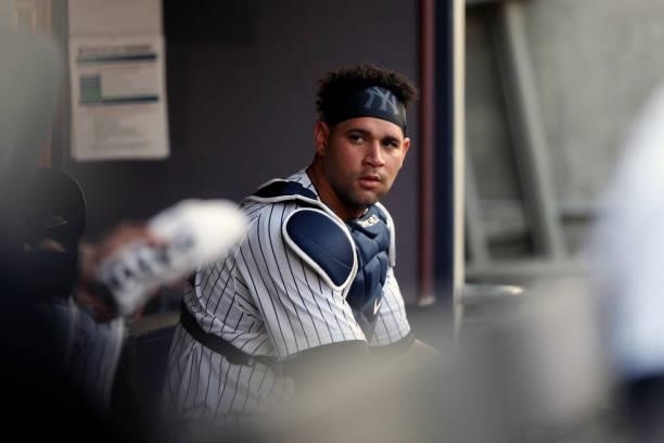 Gary Sánchez of the New York Yankees looks on from the dugout during the game between the Los Angeles Angels and the New York Yankees at Yankee...