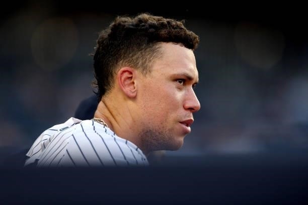 Aaron Judge of the New York Yankees looks on from the dugout during the game between the Los Angeles Angels and the New York Yankees at Yankee...