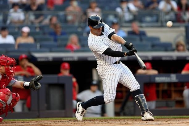 Gary Sánchez of the New York Yankees hits a solo home run in the first inning during the game between the Los Angeles Angels and the New York Yankees...