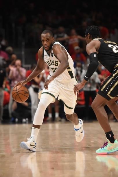 Khris Middleton of the Milwaukee Bucks handles the ball against the Atlanta Hawks during Game 4 of the Eastern Conference Finals of the 2021 NBA...