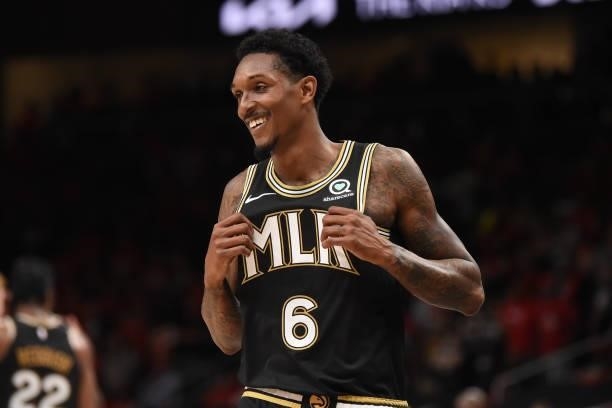 Lou Williams of the Atlanta Hawks smiles during Game 4 of the Eastern Conference Finals of the 2021 NBA Playoffs on June 29, 2021 at State Farm Arena...