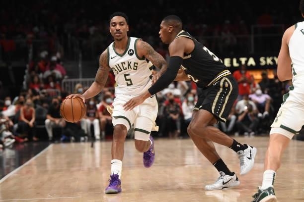 Jeff Teague of the Milwaukee Bucks handles the ball against the Atlanta Hawks during Game 4 of the Eastern Conference Finals of the 2021 NBA Playoffs...