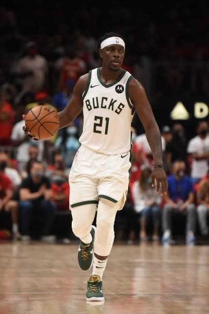 Jrue Holiday of the Milwaukee Bucks handles the ball against the Atlanta Hawks during Game 4 of the Eastern Conference Finals of the 2021 NBA...