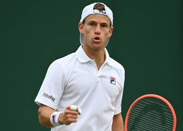 Argentina's Diego Schwartzman reacts against Britain's Liam Broady during their men's singles second round match on the third day of the 2021...