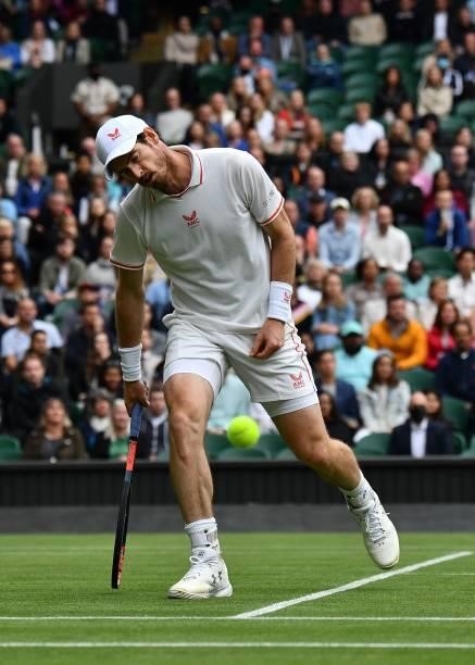 Britain's Andy Murray loses a point against Germany's Oscar Otte during their men's singles second round match on the third day of the 2021 Wimbledon...