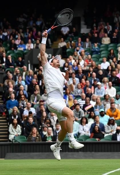 Britain's Andy Murray attempts a return against Germany's Oscar Otte during their men's singles second round match on the third day of the 2021...