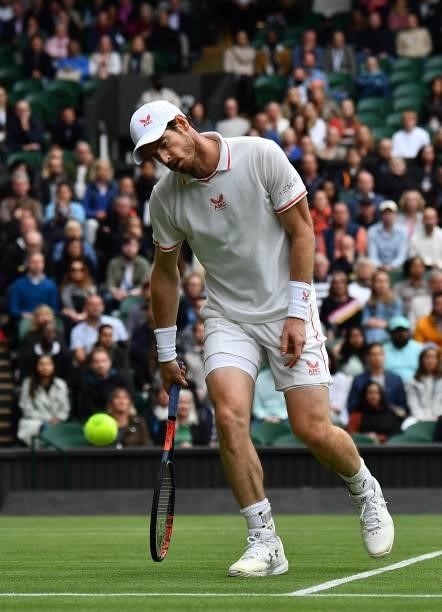 Britain's Andy Murray loses a point against Germany's Oscar Otte during their men's singles second round match on the third day of the 2021 Wimbledon...