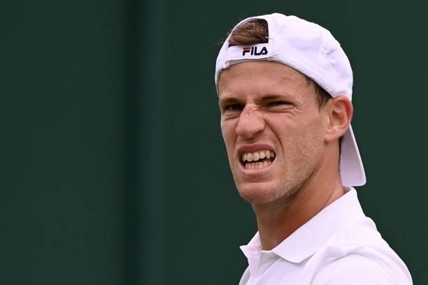 Argentina's Diego Schwartzman reacts against Britain's Liam Broady during their men's singles second round match on the third day of the 2021...