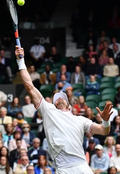 Britain's Andy Murray attempts a return against Germany's Oscar Otte during their men's singles second round match on the third day of the 2021...