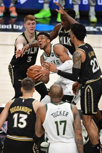 JuNE 29: Giannis Antetokounmpo of the Milwaukee Bucks drives to the basket against the Atlanta Hawks during Game 4 of the Eastern Conference Finals...