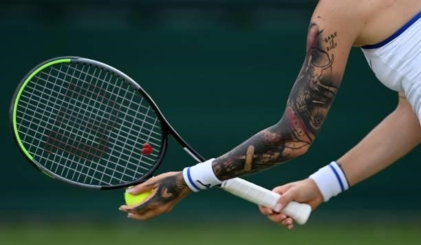 The tattoos of Czech Rebublic's Tereza Martincova are pictured on her arm as she prepares to serve during her women's singles second round match on...
