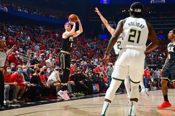 Kevin Huerter of the Atlanta Hawks shoots a three point basket during Game 4 of the Eastern Conference Finals of the 2021 NBA Playoffs on June 29,...