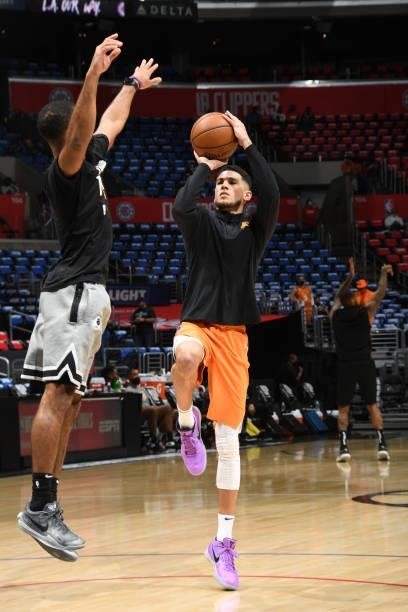 Devin Booker of the Phoenix Suns warms up prior to the game against the LA Clippers during Game 6 of the Western Conference Finals of the 2021 NBA...