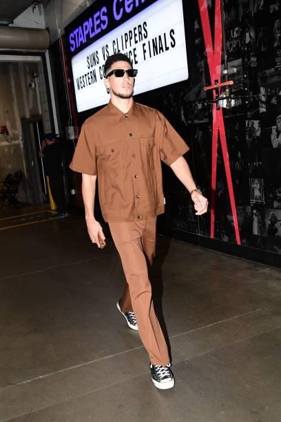 Devin Booker of the Phoenix Suns arrives to the arena before the game against the LA Clippers during Game 6 of the Western Conference Finals of the...