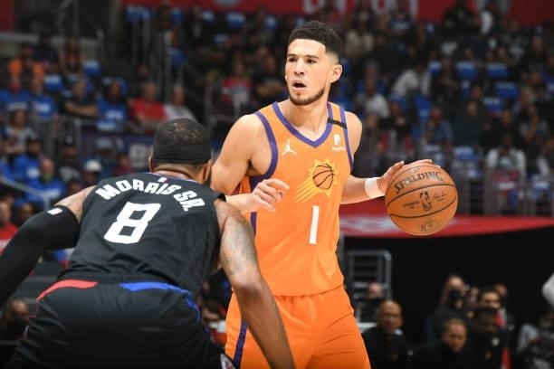Devin Booker of the Phoenix Suns dribbles the ball against the LA Clippers during Game 6 of the Western Conference Finals of the 2021 NBA Playoffs on...
