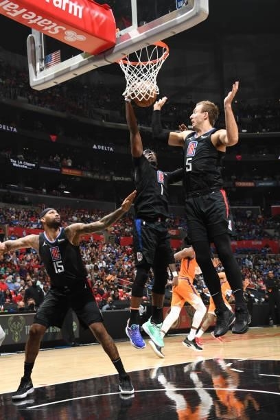 Reggie Jackson of the LA Clippers rebounds the ball against the Phoenix Suns during Game 6 of the Western Conference Finals of the 2021 NBA Playoffs...