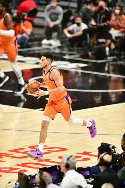 Devin Booker of the Phoenix Suns handles the ball during the game against the LA Clippers during Game 6 of the Western Conference Finals of the 2021...