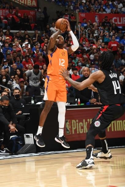 Torrey Craig of the Phoenix Suns shoots a three point basket against the LA Clippers during Game 6 of the Western Conference Finals of the 2021 NBA...