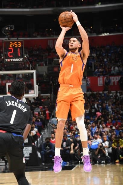 Devin Booker of the Phoenix Suns shoots the ball against the LA Clippers during Game 6 of the Western Conference Finals of the 2021 NBA Playoffs on...