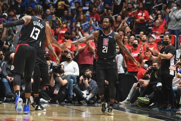 Patrick Beverley of the LA Clippers high fives Paul George of the LA Clippers during Game 6 of the Western Conference Finals of the 2021 NBA Playoffs...