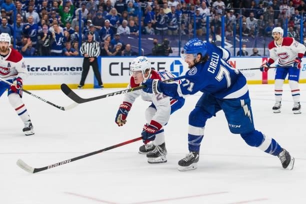 Anthony Cirelli of the Tampa Bay Lightning shoots against Cole Caufield of the Montreal Canadiens during the first period of Game Two of the Stanley...