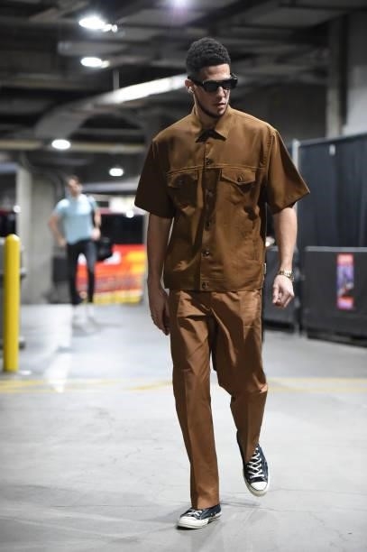 Devin Booker of the Phoenix Suns arrives to the arena prior to the game against the LA Clippers during Game 6 of the Western Conference Finals of the...