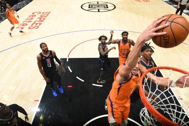 Devin Booker of the Phoenix Suns dunks the ball against the LA Clippers during Game 6 of the Western Conference Finals of the 2021 NBA Playoffs on...