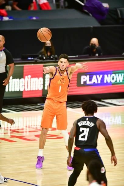 Devin Booker of the Phoenix Suns passes the ball during the game against the LA Clippers during Game 6 of the Western Conference Finals of the 2021...