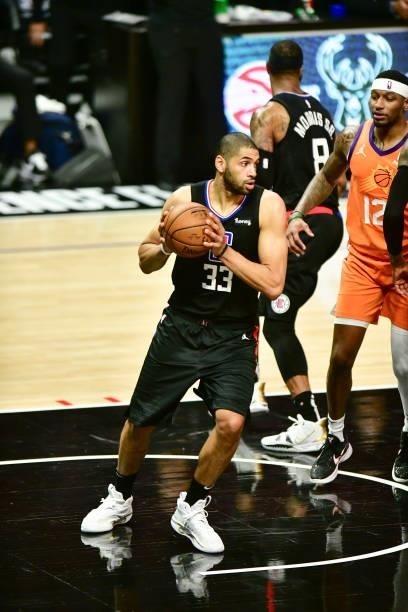 Nicolas Batum of the LA Clippers rebounds the ball during the game against the Phoenix Suns during Game 6 of the Western Conference Finals of the...