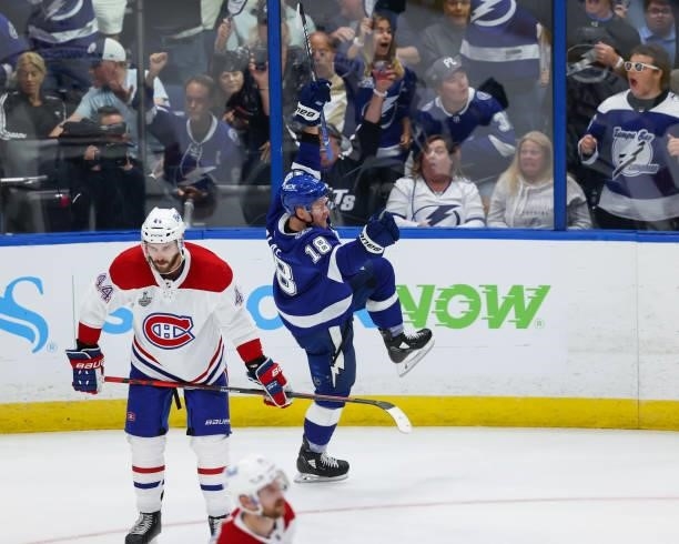 Ondrej Palat of the Tampa Bay Lightning celebrates his goal against Joel Edmundson and the Montreal Canadiens during the third period of Game Two of...