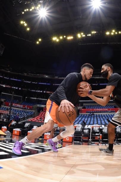 Devin Booker of the Phoenix Suns warms up prior to the game against the LA Clippers during Game 6 of the Western Conference Finals of the 2021 NBA...