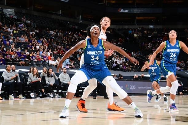 Sylvia Fowles of the Minnesota Lynx and Brittney Griner of the Phoenix Mercury fight for position during the game on June 30, 2021 at Phoenix Suns...