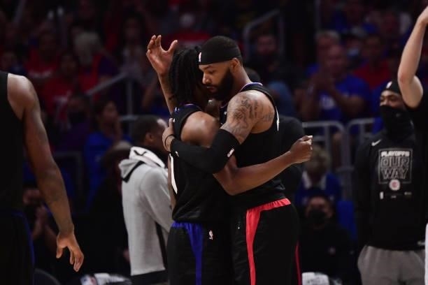 Terance Mann hi-fives Marcus Morris Sr. #8 of the LA Clippers during Game 6 of the Western Conference Finals of the 2021 NBA Playoffs on June 30,...