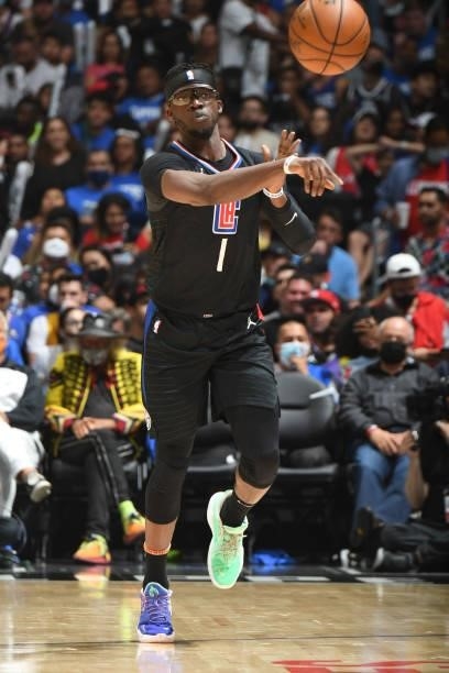 Reggie Jackson of the LA Clippers passes the ball against the Phoenix Suns during Game 6 of the Western Conference Finals of the 2021 NBA Playoffs on...