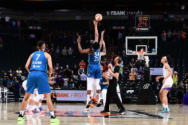 Sylvia Fowles of the Minnesota Lynx jumps for the ball during the opening tip-off during the game against the Phoenix Mercury on June 30, 2021 at...