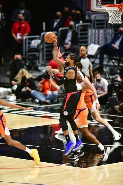Paul George of the LA Clippers passes the ball during the game against the Phoenix Suns during Game 6 of the Western Conference Finals of the 2021...