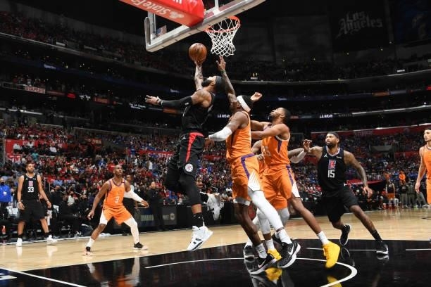 Marcus Morris Sr. #8 of the LA Clippers drives to the basket against the Phoenix Suns during Game 6 of the Western Conference Finals of the 2021 NBA...