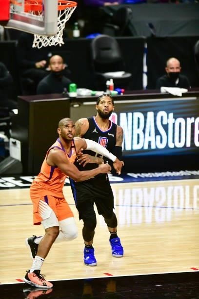 Chris Paul of the Phoenix Suns and Paul George of the LA Clippers fight for position during the game during Game 6 of the Western Conference Finals...
