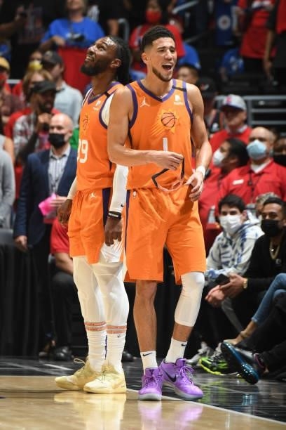 Devin Booker of the Phoenix Suns and Jae Crowder of the Phoenix Suns celebrate during Game 6 of the Western Conference Finals of the 2021 NBA...