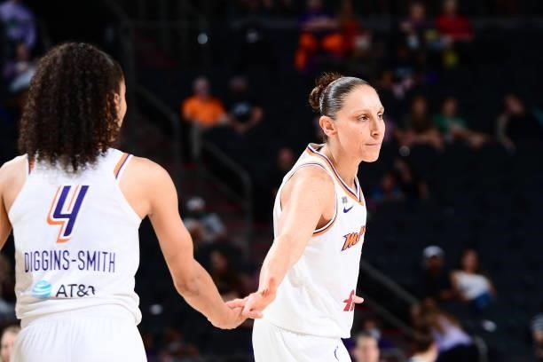 Diana Taurasi of the Phoenix Mercury high fives her teammate during the game on June 30, 2021 at Phoenix Suns Arena in Phoenix, Arizona. NOTE TO...