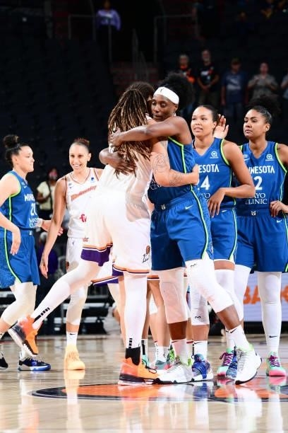 Sylvia Fowles of the Minnesota Lynx hugs Brittney Griner of the Phoenix Mercury before the game on June 30, 2021 at Phoenix Suns Arena in Phoenix,...