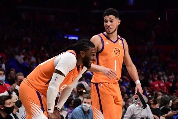 Devin Booker talks with Jae Crowder of the Phoenix Suns during Game 6 of the Western Conference Finals of the 2021 NBA Playoffs on June 30, 2021 at...