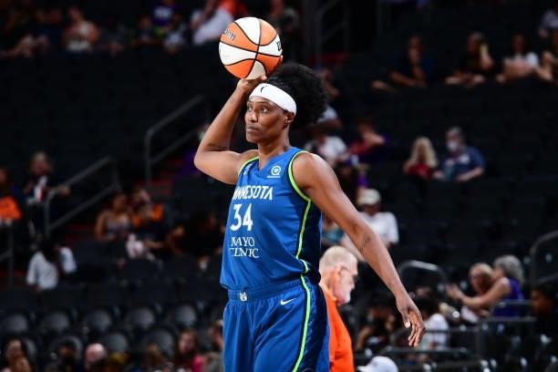 Sylvia Fowles of the Minnesota Lynx stretches before the second half of the game between the Phoenix Mercury on June 30, 2021 at Phoenix Suns Arena...