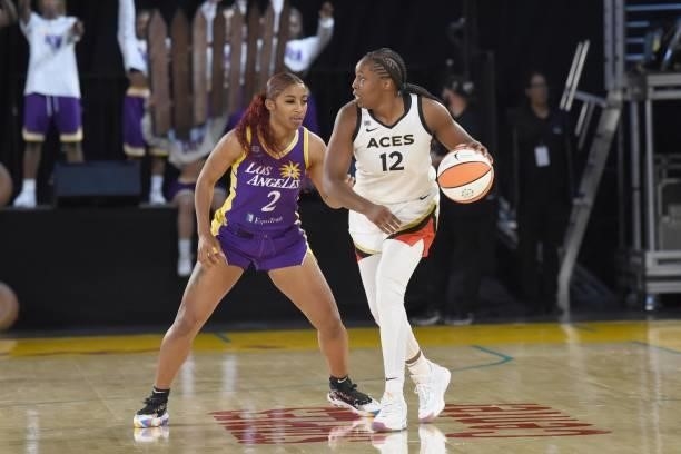 Te'a Cooper of the Los Angeles Sparks plays defense on Chelsea Gray of the Las Vegas Aces on June 30, 2021 at the Los Angeles Convention Center in...