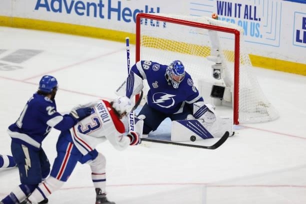 Goalie Andrei Vasilevskiy of the Tampa Bay Lightning makes a save against Tyler Toffoli of the Montreal Canadiens during the third period of Game Two...