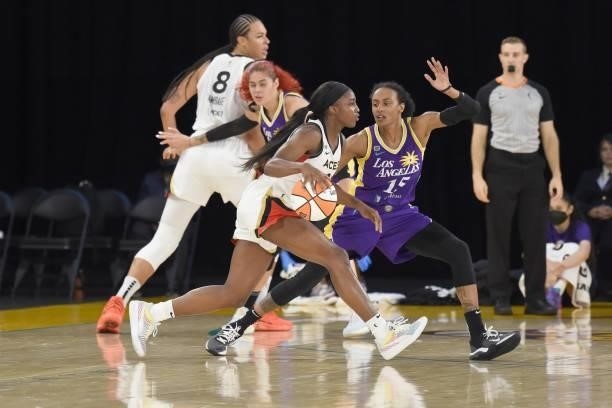Brittney Sykes of the Los Angeles Sparks plays defense on Jackie Young of the Las Vegas Aces on June 30, 2021 at the Los Angeles Convention Center in...