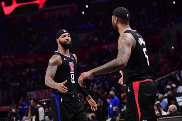 Marcus Morris Sr. #8 hi-fives DeMarcus Cousins of the LA Clippers during Game 6 of the Western Conference Finals of the 2021 NBA Playoffs on June 30,...